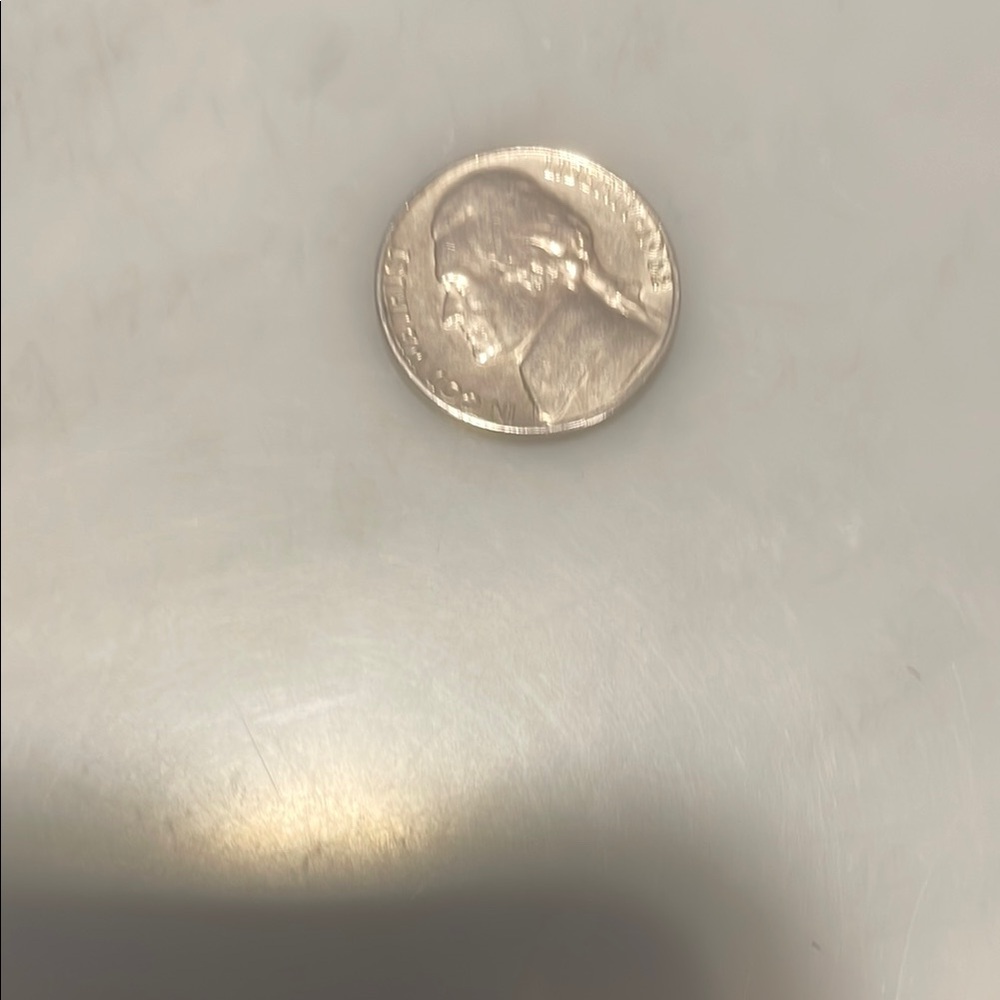 Silver Coin with In God We Trust Inscription